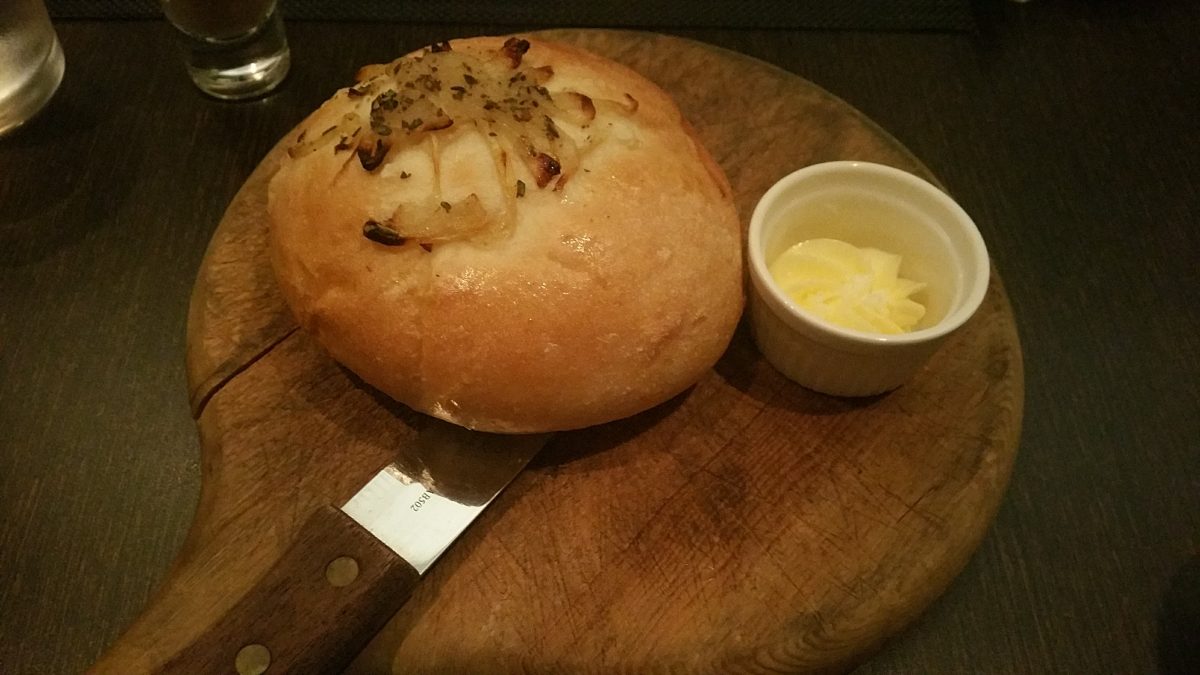 Complimentary onion bread with butter